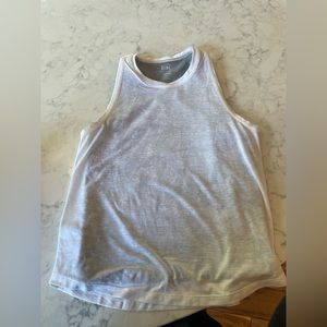 White shirt with grey camo on the inside and grey stripes on the back